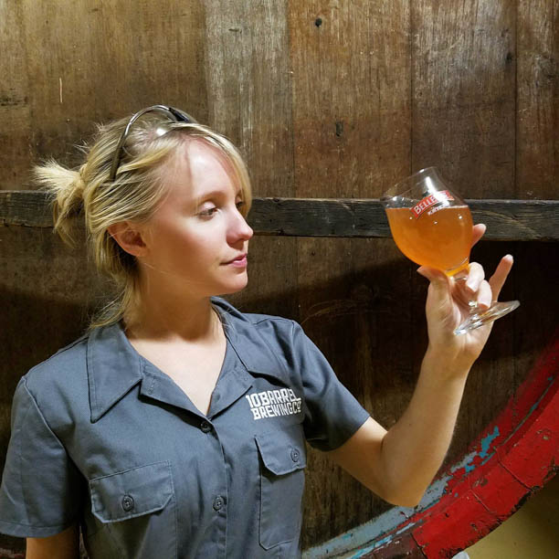 Whitney sampling the collaboration beer with Bell-Vue Brewing.